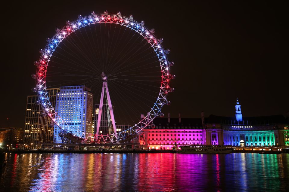 The London Eye and buildings along the South Bank are lit up with the colours of the Union flag during a nationwide round of applause