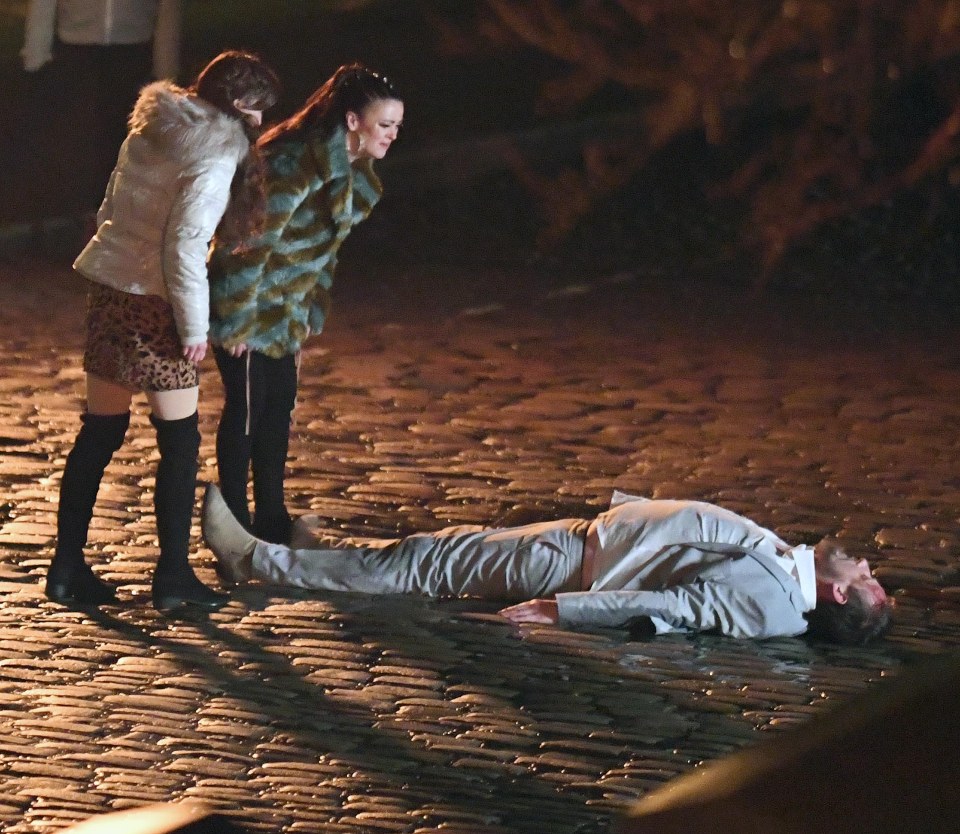 The man appears to be motionless after the accident