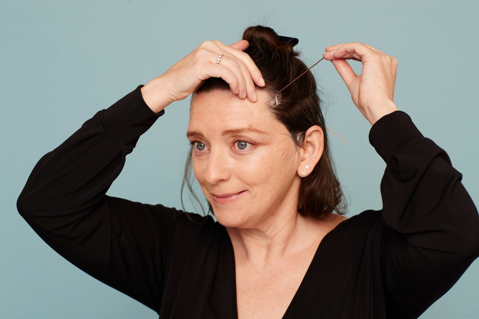 BIT OF A STRETCH  . . . facelift band goes round back of head