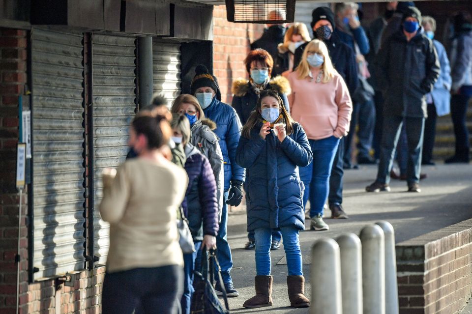 People wait in line for a coronavirus test at a surge test centre in the Bristol and south Gloucestershire area on February 9