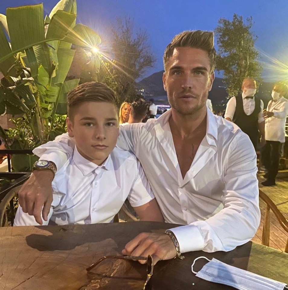 He also told her about becoming a father at 17. Pictured with his son above