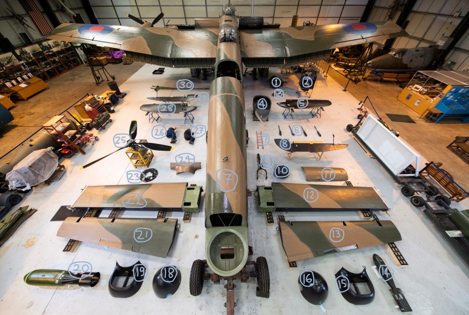 This Lancaster bomber is being taken apart