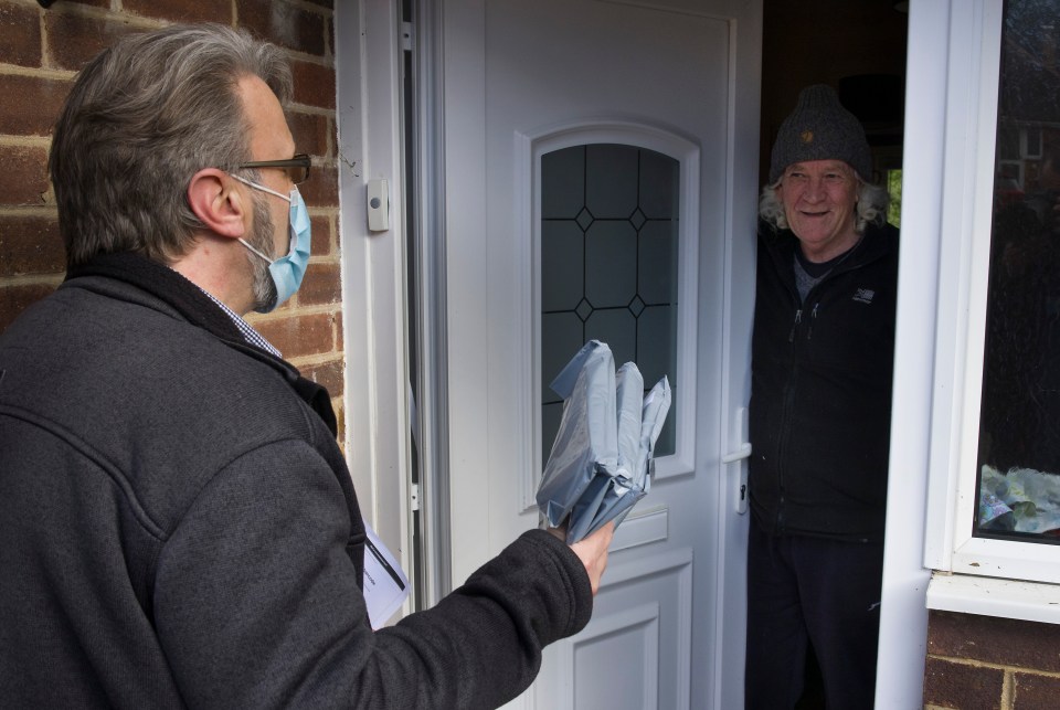Surge testing has been carried out in multiple locations in England to find cases of the South African variant. Pictured: Door-to-door testing in Woking, February 18