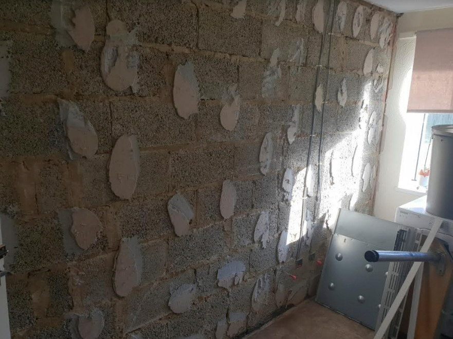 Asbestos was found in the walls of Marcus and Laura's flat