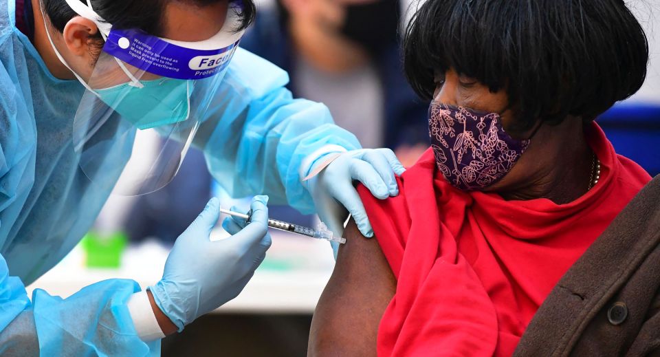 The Johnson & Johnson vaccine would be the third vaccine to be rolled out in America Pictured: Nurse Angelo Bautista administers the Moderna Covid-19 vaccine in Los Angeles, California, February 24