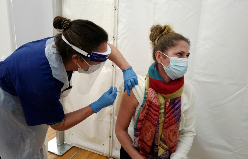  Care Home Worker Marie Annn Gynn receiving the AstraZeneca/Oxford Covid-19 vaccination 