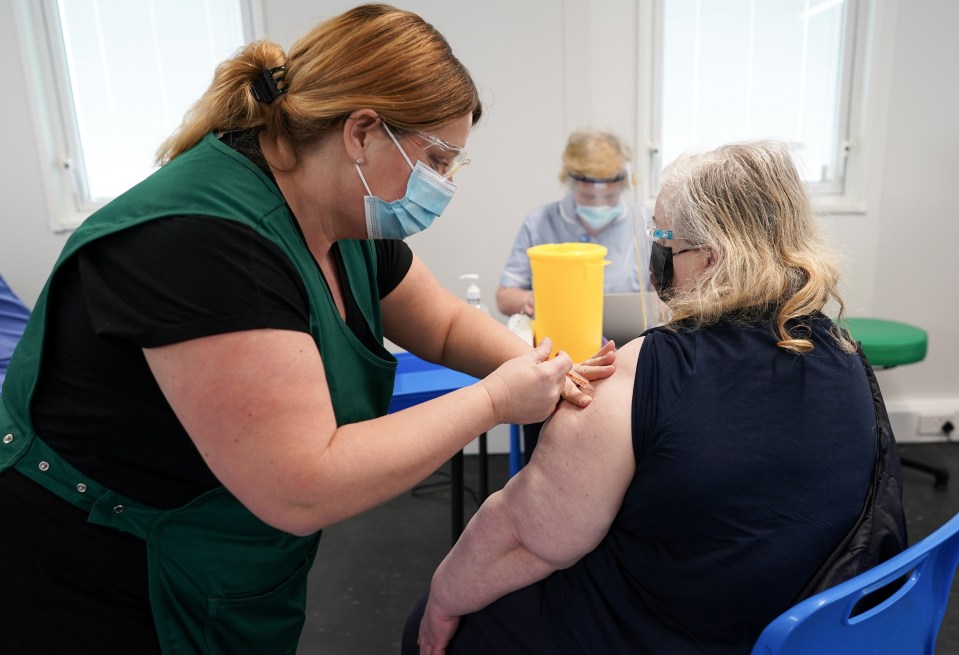 Scientists are increasingly confident that the current vaccines being deployed  work against the Kent variant. Pictured: Wendy Allinson receives the AstraZeneca/Oxford University Covid-19 vaccine in Darlinghton, March 1