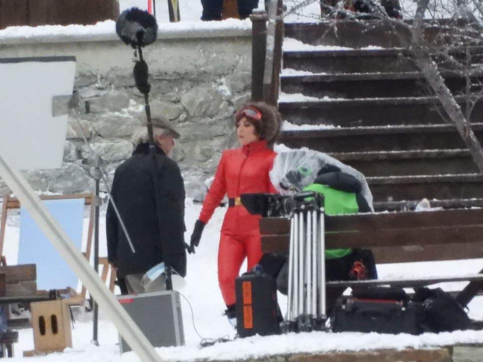 The singer rocked a red PVC ski suit