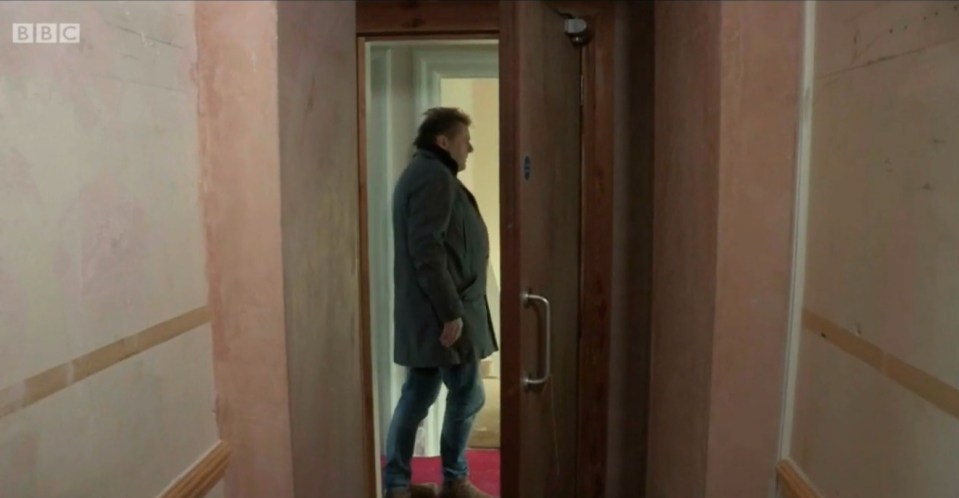 The property expert managed to walk through a door connecting to the house next door
