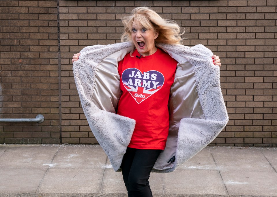 Sherrie Hewson flashed The Sun’s Jabs Army badge while volunteering at a vaccination centre