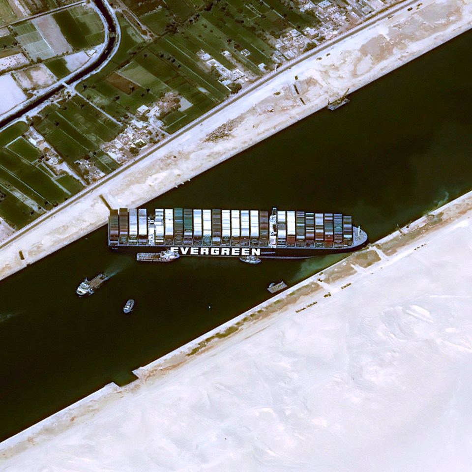 The Ever Given wedged into the side of the Suez Canal as seen from space