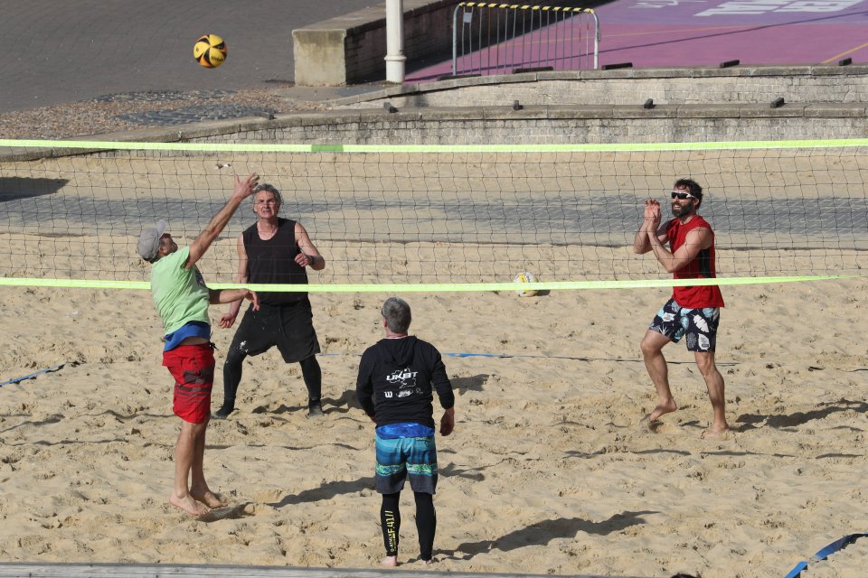 A game of volleyball in Brighton on Happy Monday