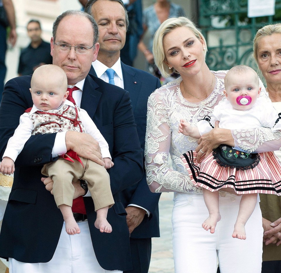 Prince Albert and his wife, South African swimmer Charlene Wittstock, and two children