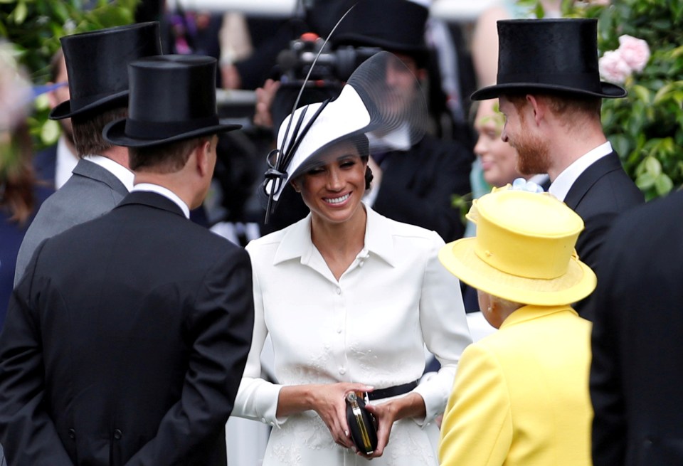 Meghan during a Royal duty before Megxit