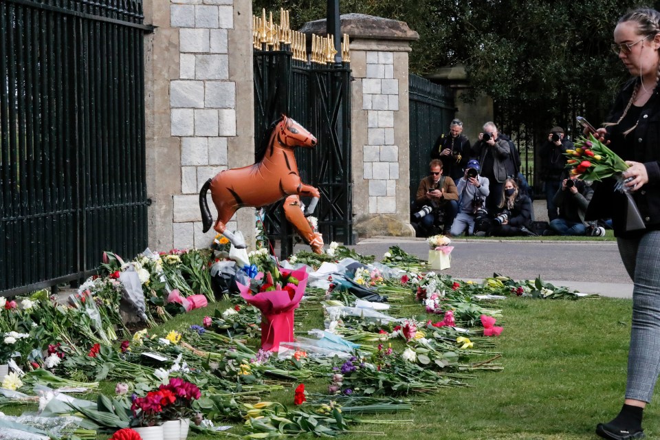 A horse in tribute to the Prince's love of riding among the flowers at Windsor Castle