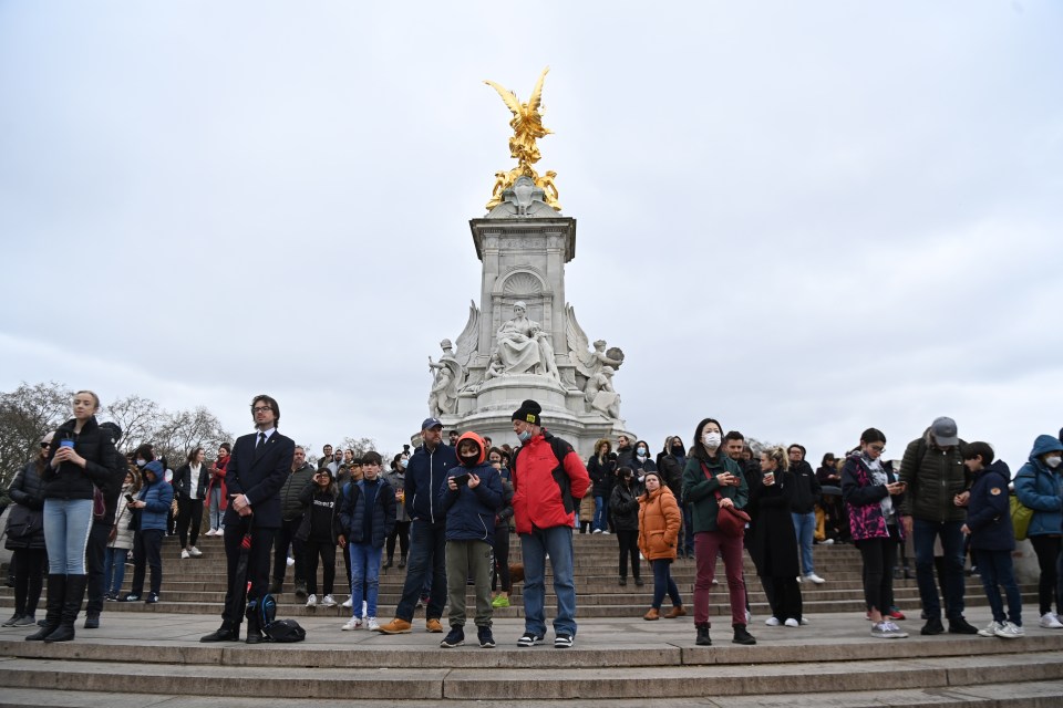 Crowds around the Victoria Memorial opposite Buckingham Palace