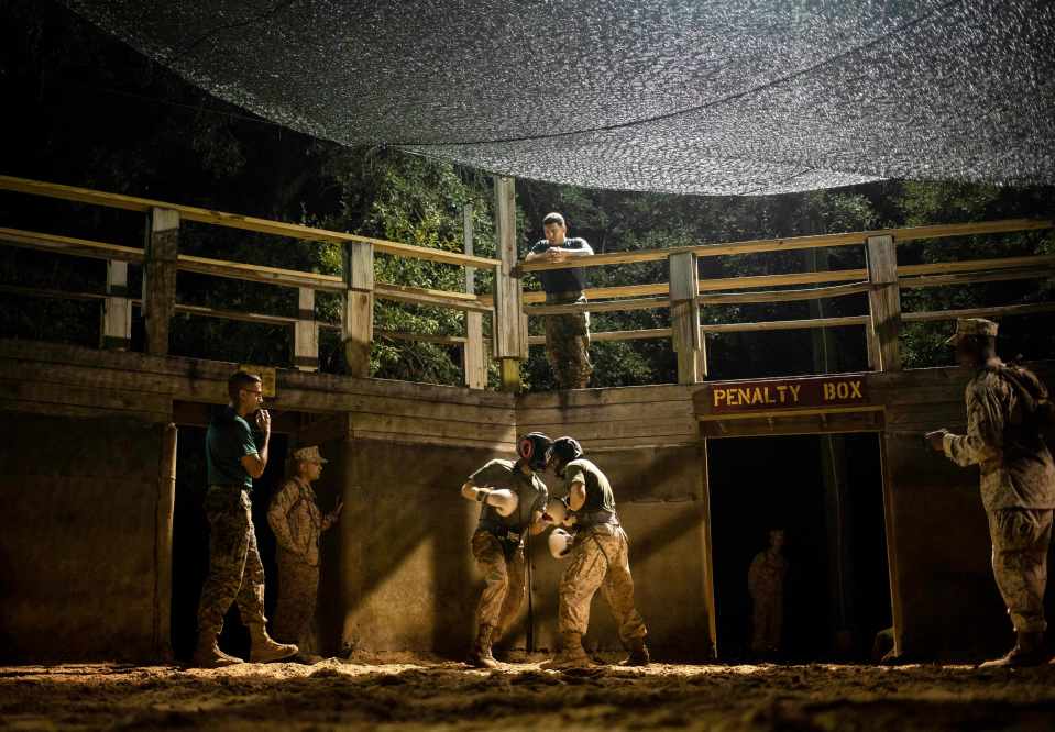 Drill Instructors and staff with Mike Company, 3rd Recruit Training Battalion, watch and observe as their recruits battle each other during Crucible boxing bouts on Marine Corps Recruit Depot Parris Island