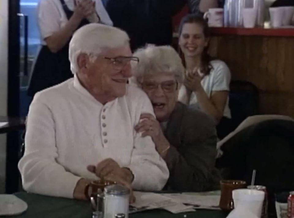 Frances' adoptive parents, Vernon and Noreen, react with delight at her first Oscar win for Fargo