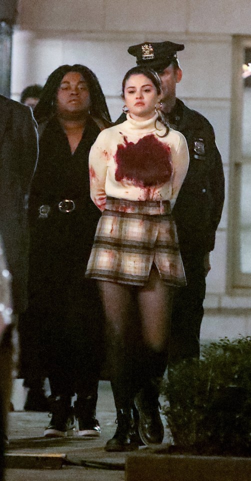 Selena Gomez appears covered in blood as she films her latest TV role