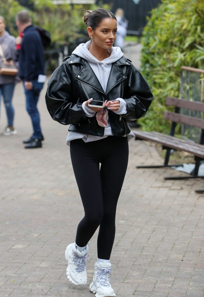 Newly single Maura looked causal as she visited Thorpe Park