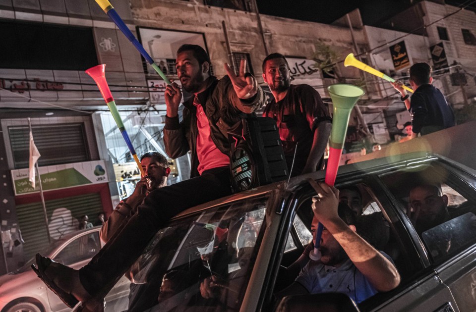 Thrilled Palestinians celebrate the cease-fire agreement between Israel and Hamas