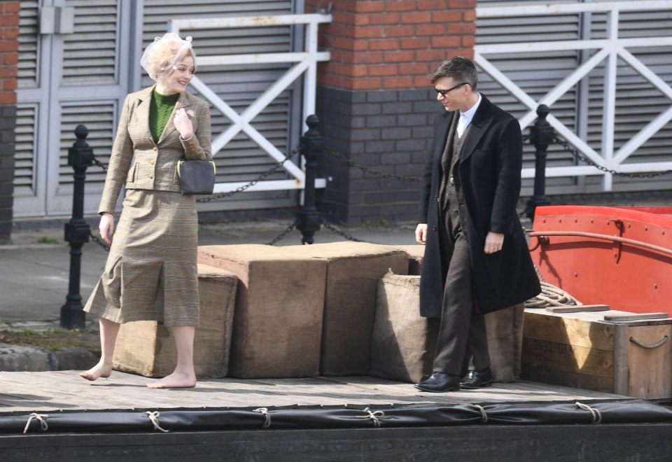 The pair giggled as they walked along the canal together