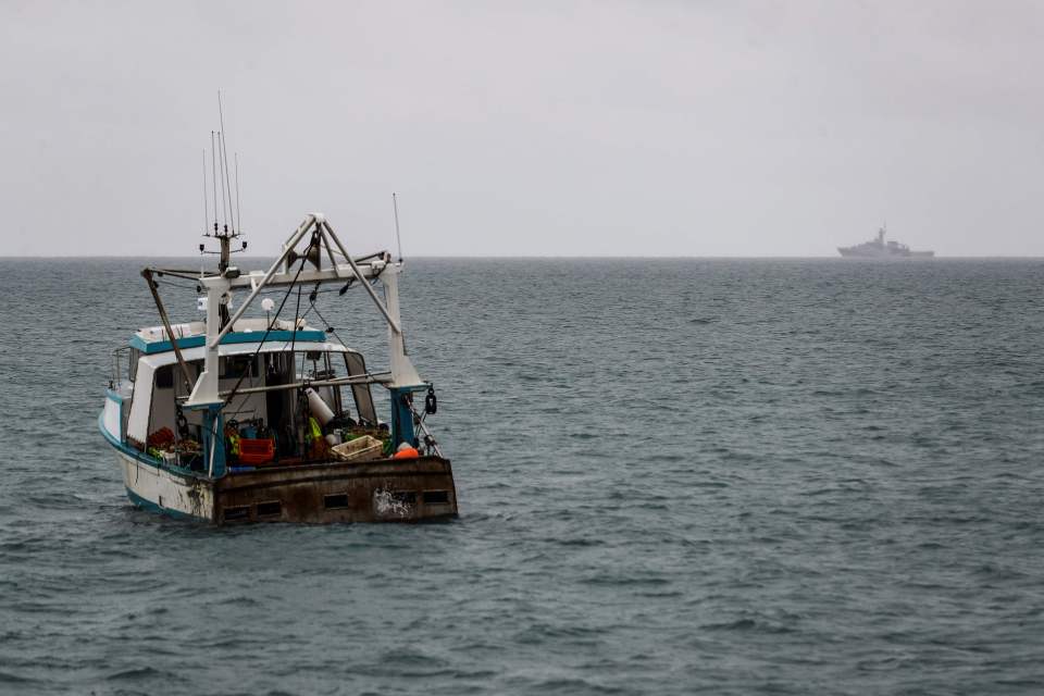 HMS Tamar, pictured in the distance, rushed to Jersey "as a precaution" today