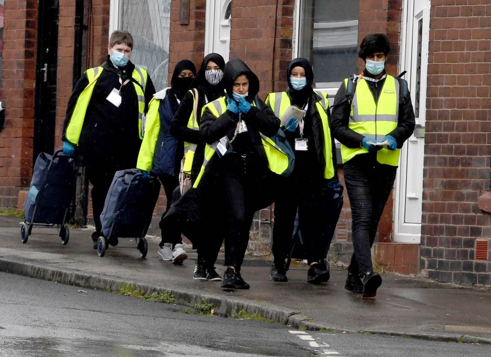 Council workers swooped in to deliver tests today