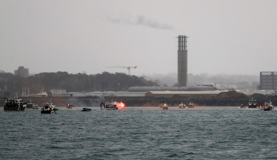 Another flare is set off by a French fisherman