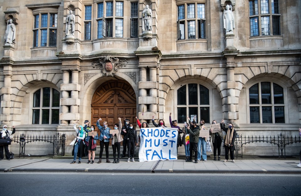 Demonstrators have protested in front of the Rhodes statue on the High Street in Oxford as part of the Black Lives Matter movement.