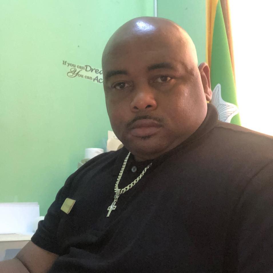 Hartin is accused of shooting top Belize officer Henry Jemmot