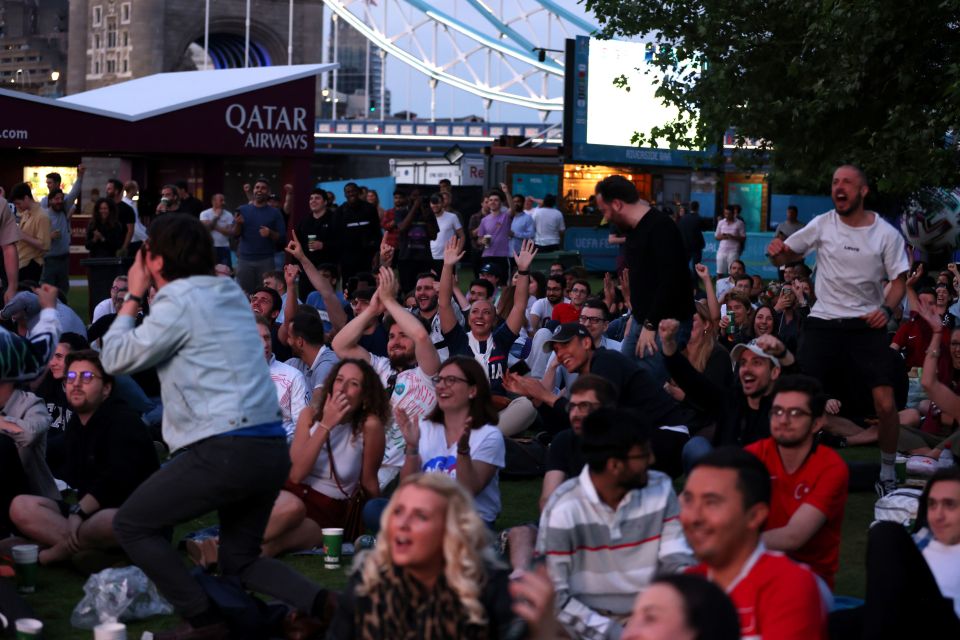 Fans at Potters Fields Park as they watch the UEFA Euro 2020 Group A opening match