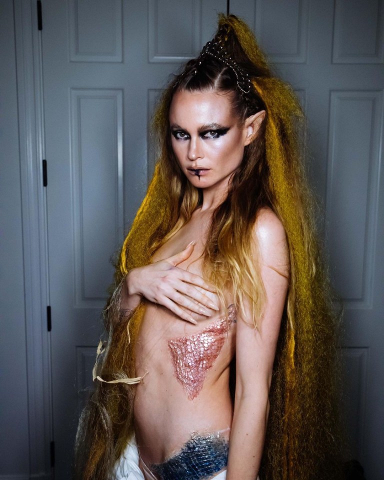 The model posted picture of her wearing  elf ears and a wild yellow wig