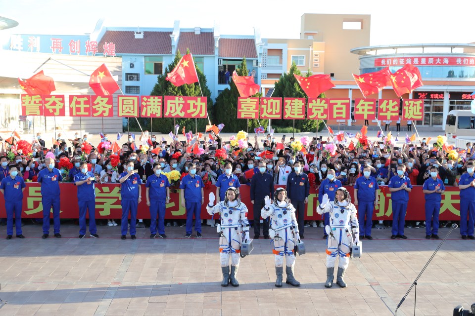 The crew waved to crowds before they set off on their three month journey