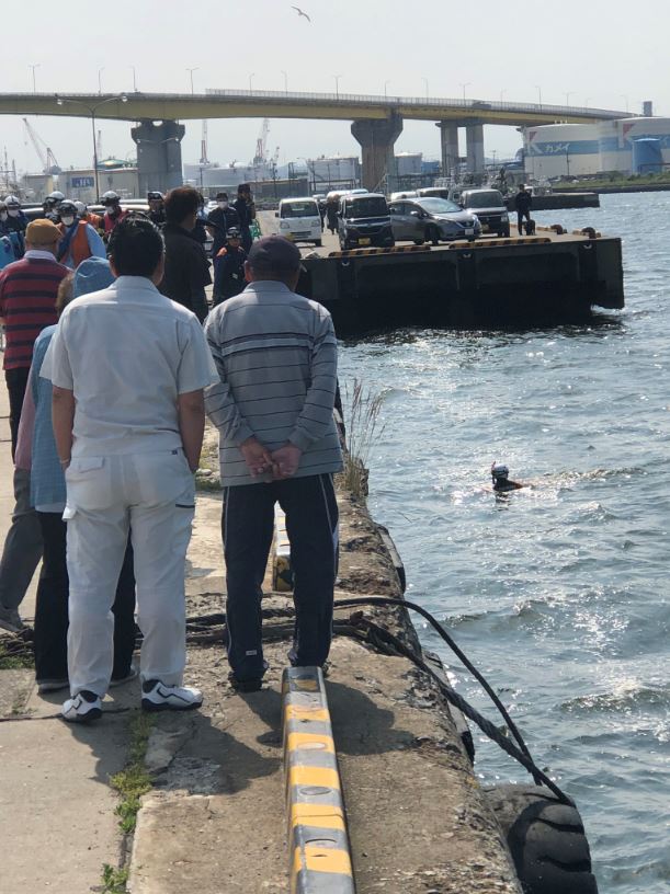 Crowds gathered as emergency services raced to the scene expecting to find a drowning woman