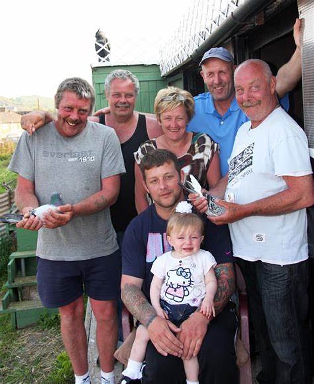 Richard Sayers (pictured centre, with his family) says 300 birds from his club are missing
