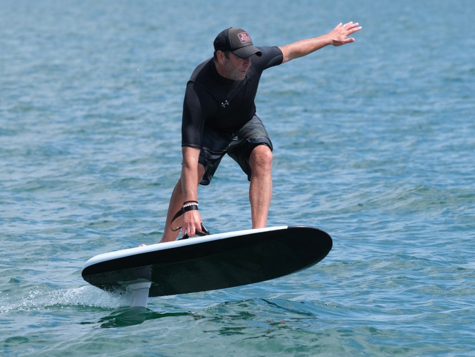 Howard was shooting photos of Toby on a hydrofoil board