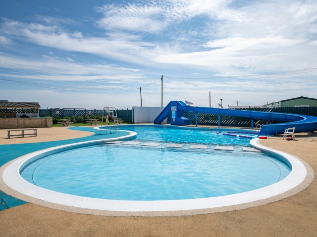 The Barmston Beach park in Yorkshire has an outdoor heated pool with a big waterslide for the kids
