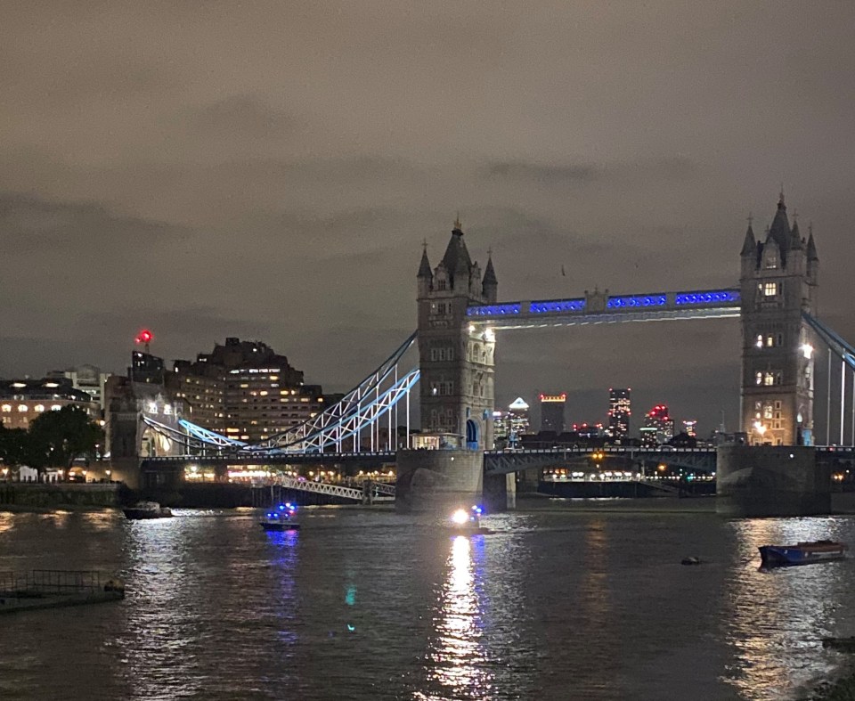 Three police boats were seen in the water at Tower Bridge last night