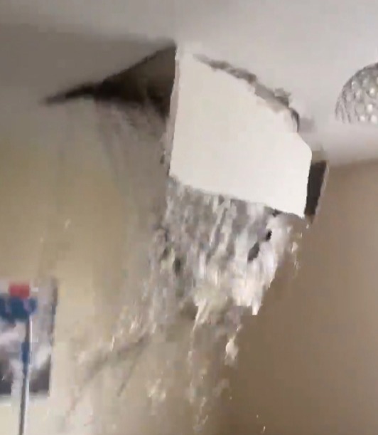 The ceiling then collapses and water comes gushing down