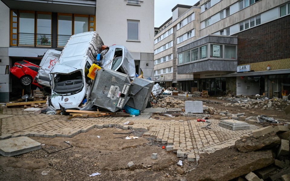 Cars are piled up after extreme floods in Shuld