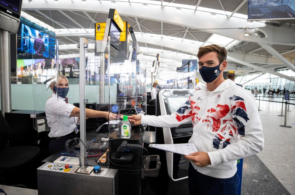 Fletcher was seen handing over his boarding documents alongside his team-mates