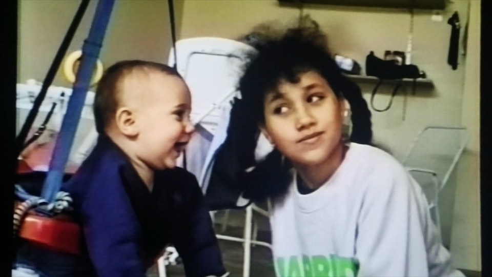 Meghan aged 11 with her baby nephew