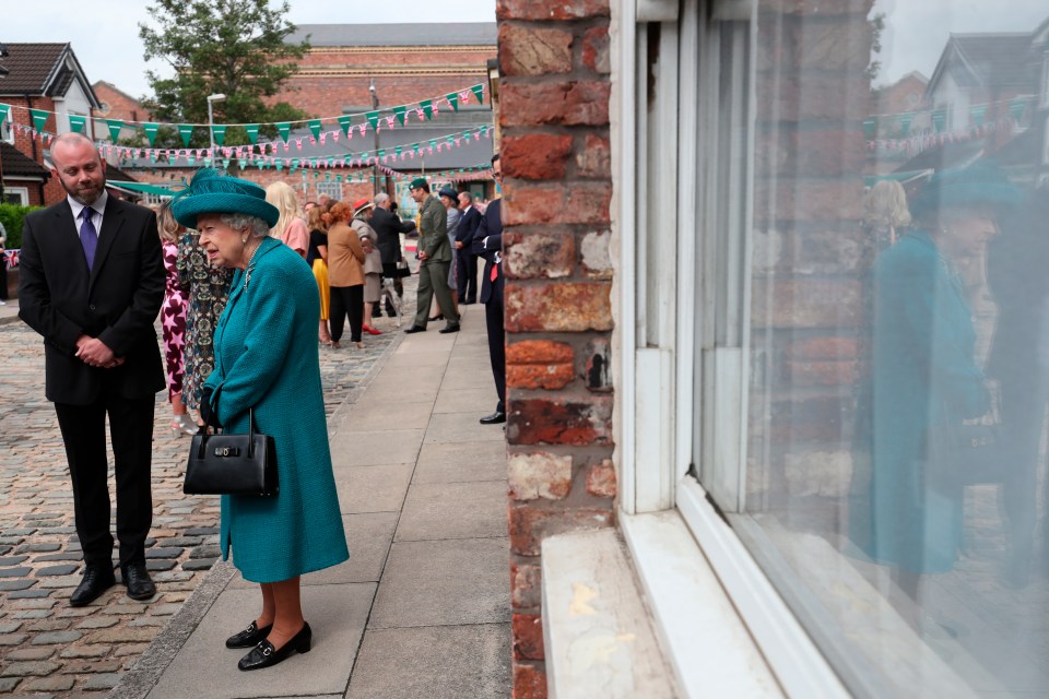 Her Majesty was greeted by cast and crew at the Salford set today