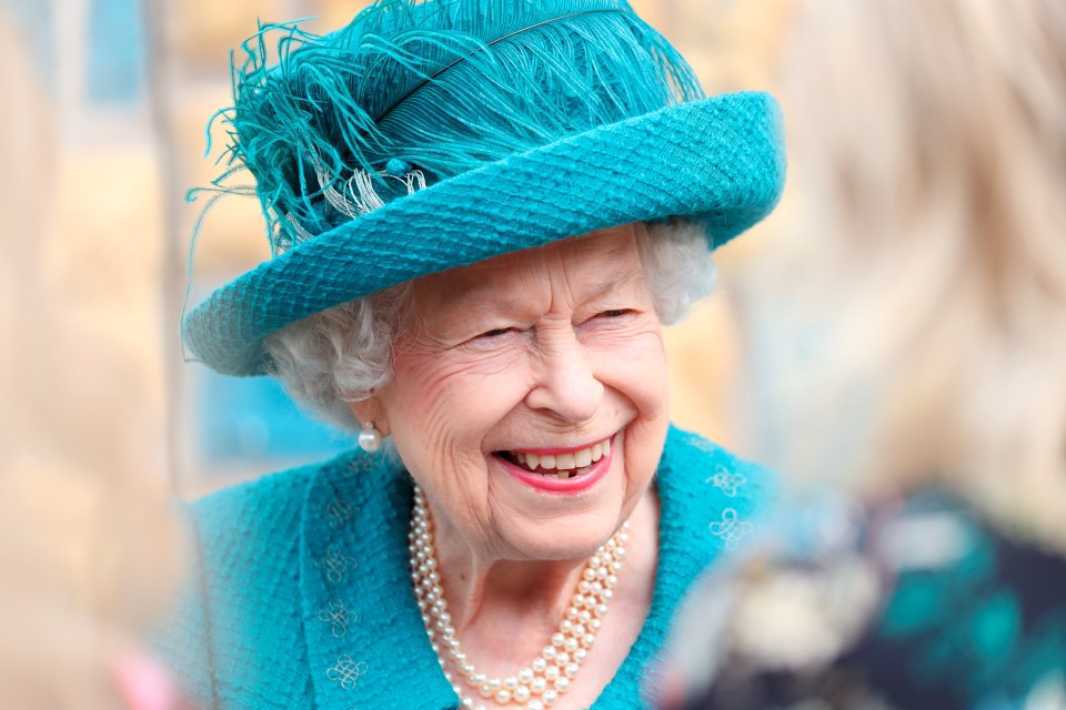 The Queen was all smiles as she visited the Coronation Street set today