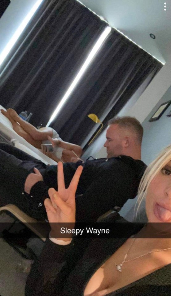 Elise Melvin posed beside the seated ex-England captain in a budget hotel room on Sunday morning