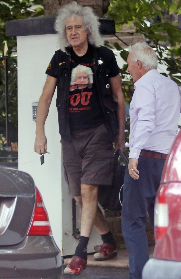 Brian May steps out with a picture of himself on his t-shirt