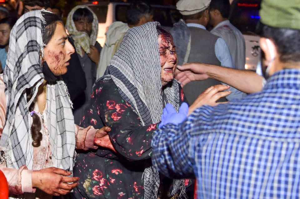 Bloodied victims of the blast reach hospital