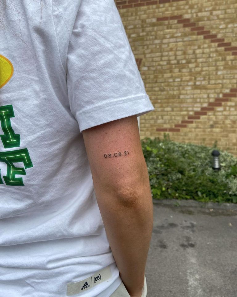The couple both have '08.08.21' - the day they met - inked on the back of their arm