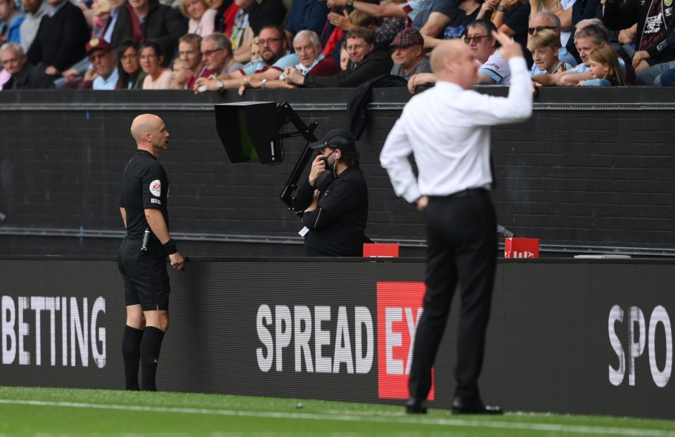 Dyche fumes as Anthony Taylor looks at the VAR monitor